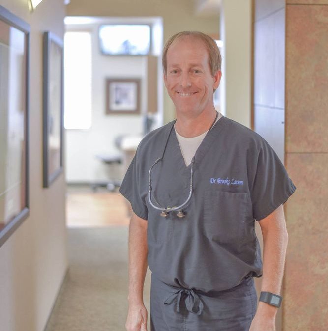 Dr Brooks Larson, dentist in Brea, California, specializing in cosmetic and family dentistry with advanced technology.